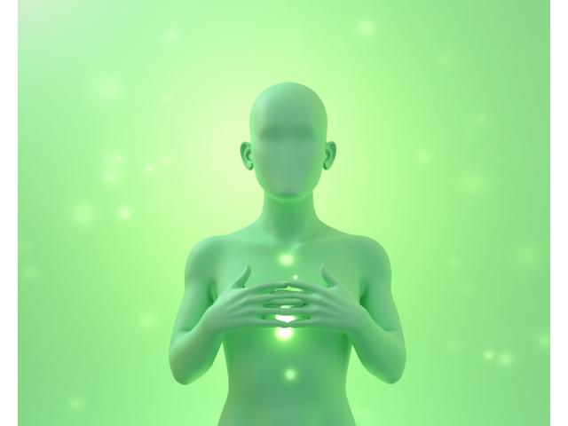 A serene person practicing deep breathing with hands over their chest, surrounded by gentle, abstract visual cues indicating breath flow.